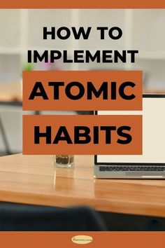 an open laptop computer sitting on top of a wooden table with the words how to implement atomic