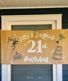 a birthday sign hanging from the side of a door