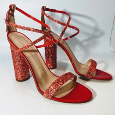 Giuseppe Zanotti Glitter Leather Sandal Womens Size 8.5 Nwt. 100% Authentic Made In Italy Color/Material: Geranium Leather (Between Pink & Red) Design Details: Sequin Glitter Details, Criss Cross Strap Buckle Closure Lightly Padded Leather Insole Smooth Leather Sole 4.5” Heel Dust Bag Msrp: $750 Embellished Ankle Strap Sandals For Party Season, Glamorous Party Sandals With Heel Strap, Glamorous Heel Strap Sandals For Party Season, Elegant Sandals With Sequins For Night Out, Holiday Embellished Ankle Strap Heels, Elegant Sequined Sandals For Night Out, Block Heel Embellished Sandals For Party Season, Embellished Block Heel Sandals For Party Season, Holiday Heels With Heel Strap For Night Out