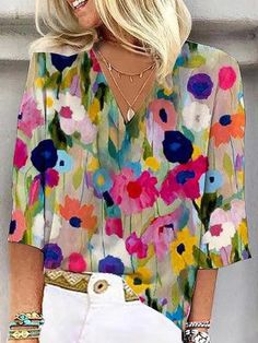 Multicolor Floral Print V-neck Blouse, Spring V-neck Top With Colorful Pattern, Multicolor V-neck Top For Spring, Printed Half Sleeve Tops For Vacation, Multicolor Half Sleeve Blouse For Summer, Summer Printed Half Sleeve Blouse, Printed Half Sleeve Summer Blouse, Casual Multicolor Printed Blouse, Multicolor Half Sleeve Tops For Beach