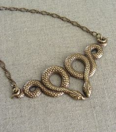 Vintage Snake Necklace  Vintage  Brass by chloesvintagejewelry Vintage Bronze Jewelry For Crafting, Symbolic Copper Jewelry Gift, Symbolic Copper Jewelry As Gift, Symbolic Copper Jewelry For Gifts, Nickel-free Copper Necklaces For Crafting, Vintage Brass Jewelry For Crafting, Handmade Symbolic Copper Jewelry, Brass Pendant For Crafting, Necklace Snake