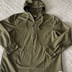 The North Face Battlement Quarter Zip Pull Over Jacket In Olive Green. Nwot. Features A Hood With Drawstring, Center Pocket And Side Zipper. The North Face Windbreaker With Pockets For Fall, The North Face Fall Windbreaker With Pockets, Hooded The North Face Windbreaker With Pockets, Urban Outerwear With Pockets By The North Face, Long Sleeve Cotton Windbreaker For Hiking, Cotton Long Sleeve Windbreaker For Hiking, Cotton Long Sleeve Utility Jacket For Hiking, Casual The North Face Windbreaker With Pockets, Casual The North Face Hooded Jacket With Pockets