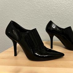 Gorgeous Black Patent Leather Booties By Valentino Garavani. These Super Sexy Couture Heels Have Been Worn Only A Few Times. In Very Good Condition Aside From A Small Scuff On The Inside Of One Heel. Made In Italy. Sleek Ankle-high Heels For Formal Occasions, Sleek Ankle-high Heels For Formal Events, Ankle-high Patent Leather Evening Heels, Elegant Leather Ankle-high Court Shoes, Pointed Toe Heels With Leather Sole For Night Out, Elegant Ankle-high Leather Court Shoes, Formal Ankle Boot With Sculpted Heel, Patent Leather Court Shoes For Night Out, Fitted Patent Leather Court Shoes For Night Out