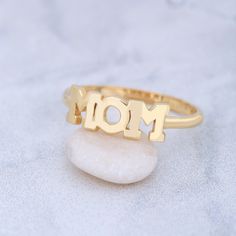 ★14K Solid Gold Mother Ring, Sterling Silver Mother Ring, Script Mom Ring, Mom Ring, Christmas Gift, Valentine's Day Gift, Mother's Day Gift★ ★ IMPORTANT SHIPPING & PRODUCTION DETAILS!! ★ RINGS: All rings are made to order at the selected size requested during checkout. I do not use a formula to determine ring sizing for wide bands (Unless noted within the listing) so if you select a size 6 and purchase 8-10 rings each ring will rest at the US ring size 6. All rings made at US ring sizes though Mother's Day Gift Open Ring, Customized Yellow Gold Rings For Gift, Mother's Day Name Engraved Open Ring, Customized Gold Rings For Mother's Day, Customizable Rings For Mother's Day Gift, Handmade Rings For Anniversary On Mother's Day, Handmade Rings For Anniversary And Mother's Day, Handmade Gold Ring For Mother's Day, Gold Handmade Rings For Mother's Day