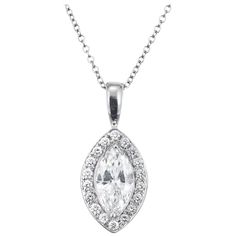 .70ct Marquise diamond with a simple halo of round diamonds, set in 18k white gold on a 16 inch chain. Crafted in the Peter Suchy workshop. EGL certified. 1 Marquise diamond, approx. total weight .70cts, I – J, SI3, EGL certificate # US312297801D 18 round full cut diamonds, approx. total weight .18cts, H, VS 18k white gold 16 inch chain Top to bottom: 19.91mm or .98 inch with bail Top to bottom: 14.06mm or .55 inch without bail Width: .35mm or 8.93 inch Depth: 3.55mm 1.8 grams