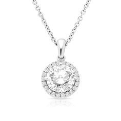 Surprise the one you adore with this classic 18K white gold Diamond Halo Pendant Necklace. The shimmering pendant showcases a classic round brilliant cut diamond artfully set to enhance size and sparkle - wrapped in a pave-lined white diamond halo. This radiant look is one she'll turn to often, everyday and on special occasions. An amazing and thoughtful anniversary gift for your loved one. 18 Karat White Gold Total Diamonds Weight: 1.35 carat Center Diamond Weight 1.25 Carat Shape: Round Brilli Halo Pendant Diamond Necklace With Cubic Zirconia, Diamond Necklace With Halo Setting, Cubic Zirconia Halo Pendant Diamond Necklace, Halo Pendant Cubic Zirconia Diamond Necklace, Halo Cubic Zirconia Pendant Diamond Necklace, Classic Halo Diamond Necklace In Cubic Zirconia, Classic Cubic Zirconia Diamond Necklace With Halo, Classic Halo Diamond Necklace With Round Pendant, Classic Cubic Zirconia Halo Diamond Necklace