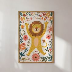 a lion painted on the wall with flowers and leaves around it's body,