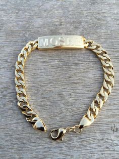 Engraved bracelet - Personalized Initial Bracelet - Gift - Men & Women Bracelet Great to give as a gift or enjoy yourself! High Quality 18 K Gold Plated Bracelet Engraved with initial letter or 1-2 names - ( note to seller on checkout ) The bracelet will be sent gift-wrapped and packed in a padded envelope to maintain the product Our jewelry are water resistant and comes with 1 year warranty Pls find more of my bracelets here: https://www.etsy.com/il-en/shop/Limajewelry?section_id=16285091&a Personalized Metal Bracelets With Nameplate, Personalized Metal Nameplate Bracelets, Adjustable Engraved Gold Wristband, Adjustable Gold Engraved Wristband, Gold Engraved Wristband For Gift, Gold Wristband With Bracelet Strap As Gift, Personalized Gold Name Bracelet For Promise, Gold Nameplate Jewelry For Friendship, Gold Name Bracelets For Friendship