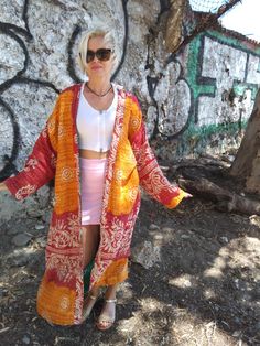 One of a kind sustainable jacket made with vintage kantha cotton.  One size only fits upto 2XL Bohemian Long Sleeve Patchwork Kimono, Long Sleeve Patchwork Kimono For Festivals, Patchwork Kimono Sleeve Outerwear For Festival, Festival Outerwear With Patchwork And Kimono Sleeves, Hippie Long Kimono For Fall, Long Hippie Kimono For Fall, Fall Hippie Long Kimono, Bohemian Long Sleeve Kimono For Festivals, Hippie One-size Kimono For Fall