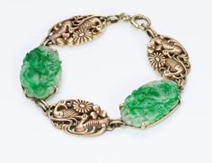 Carved Jade & Gold Bracelet.Vintage 14K yellow gold carved jade bracelet measures 7 inches, designed by Newark jeweler Walter Lampl circa 1930. This beautiful jade bracelet from the Art Deco era is a wonderful example of Walter Lampl's work! This artistic piece is comprised of carved jade plaques that alternate with carved gold ducks and flower motif forming a lovely link bracelet. Founded in 1921, The Walter Lampl Company NY designed particularly intricate carvings and often whimsical jewel Whimsical Jewelry, Carved Jade, Flower Motif, Jade Bracelet, Jade Carving, Bracelet Vintage, Jade Jewelry, Art Deco Era, Personalized Accessories