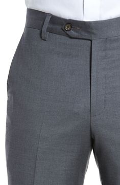 Stretch-infused wool gabardine defines handsome trousers crafted in a crisp, versatile flat-front cut. 16 1/2" leg opening; 9 1/4" front rise; 14 3/4" back rise Zip fly with button-tab closure Slant pockets; back button-closure welt pockets Unhemmed. These trousers can be hemmed for free at your local Nordstrom. Find a store Lined to the knee 98% wool, 2% spandex Dry clean Imported Men's Clothing Classic Suits With Belt Loops For Workwear, Classic Suits With Belt Loops, Classic Workwear Suits With Belt Loops, Classic Office Bottoms With Concealed Placket, Formal Flat Front Pants With Belt Loops, Workwear Dress Pants With Belt Loops And Flat Front, Classic Dress Pants With Belt Loops For Work, Workwear Flat Front Dress Pants With Belt Loops, Flat Front Pants With Extra Button For Workwear