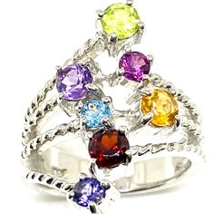 Multi Colorful Fashion Sterling Silver Ring Size 6'' This Multi Colorful Fashion Sterling Silver Ring Features Multiple Rope Textured Bands Fashioned From Sterling Silver Polished To A Brilliant Shine Prong Set Round 4mm And 3-2mm Gemstones, Shine Along The Bands For A Bright Style She Will Love. Captivate Her Imagination With The Gift Of This Unique Ring! Multicolor Multi-stone Rings For Parties, Multicolor Multi-stone Party Rings, Elegant Multicolor Sterling Silver Rings, Elegant Rainbow Sterling Silver Rings, Canary Yellow Diamonds, Amethyst Cocktail Ring, Bloodstone Ring, Stretchy Rings, Cartier Love Ring