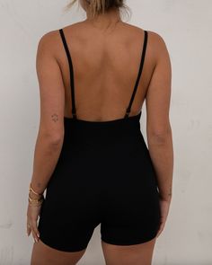 ~ 60% Nylon 32% Polyester 8% Spandex ~ Adjustable straps ~ Seamless romper ~ Ribbed material ~ Super stretchy material ~ Tight fit ~ 5" inseam ~ Model is 5'9" wearing a size Medium Fitted Bodysuit With Spaghetti Straps For Loungewear, Black Stretch Jumpsuits And Rompers With Seamless Construction, Stretch Bodysuit With Spaghetti Straps For Loungewear, Black High Stretch Seamless Jumpsuits And Rompers, Stretch Jumpsuits And Rompers With Adjustable Spaghetti Straps, Seamless Spaghetti Straps Bodysuit For Loungewear, Black Stretch Bodysuit With Spaghetti Straps, Backless Jumpsuits And Rompers With Built-in Bra And Stretch, Fitted Seamless Bodysuit