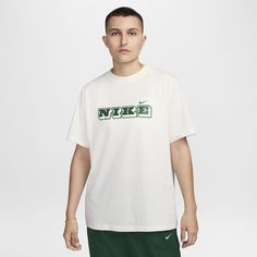 Made with soft, lightweight cotton and a loose fit, this roomy tee provides effortless style and comfort all day long. Casual Cotton T-shirt For Sports, White Crew Neck T-shirt For Leisure, Athleisure Short Sleeve T-shirt For Leisure, Oversized Nike Cotton T-shirt, Sporty Cotton T-shirt For Spring, White Sportswear T-shirt For Summer, White Summer Sportswear T-shirt, Casual Nike Crew Neck T-shirt, Athleisure Graphic Print T-shirt For Everyday