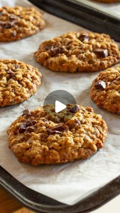 chocolate chip oatmeal cookies are on a baking sheet and ready to be baked