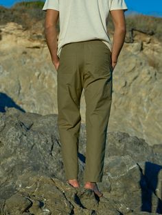 Because you are the ultimate man we designed the ultimate pants. They have everything you need to reach new heights: an elastic waistband with a hidden drawcord, pockets aplenty, a gusset in the crotch for a perfect fit, and slightly tapered legs. Easy! 100% Cotton Manufactured at a socially and environmentally responsible factory Utility Pants With Elastic Waistband For Outdoor, Outdoor Utility Pants With Elastic Waistband, Elevated Casual Straight Cargo Pants With Elastic Waistband, Outdoor Tapered Leg Pants With Hip Pockets, Relaxed Fit Tapered Pants With Elastic Waistband, Khaki Cargo Pants With Elastic Waistband And Tapered Leg, Utility Style Sweatpants With Tapered Leg, Utility Straight Leg Pull-on Pants, Outdoor Straight Cargo Pants With Elastic Waistband