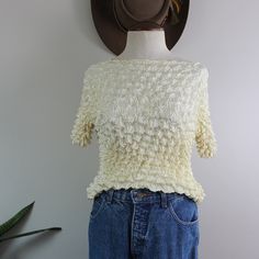 "Vintage popcorn top from the early 2000s. No tags noted, estimated size M. Please see measurements for accurate fit. Measurements (taken laid flat, doubled where necessary): This item has lots of stretch, so measurements have some give. Length: 20\" Shoulders: 14\" Chest: 38\" Sleeve length: 6\" Condition: Good vintage condition. Some discolorations noted (pictured). No other notable signs of wear. Mannequin is a size Medium and measures 34,27,34. Height 5'6\" Thank you for visiting Bug B. v i Vintage Popcorn, Clothing Vintage, Vintage 2000s, Vintage Shirt, Early 2000s, Vintage Shirts, Y2k Vintage, Popcorn, Womens Clothing Tops