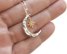 "Celestial Moon Necklace, North Star Jewelry, Moon Necklace, Star Necklace, Birthday Gift for Her,Dainty Gold Necklace, Crescent Moon Gift |DESCRIPTION| . Your choice of gold, silver or mixed metals . Pendant measures 24mm tall or 1\" . 14k gold filled chain or sterling silver . Pendants are made of 16k gold or silver plated material . Your choice of length-16\", 18\" or 20\" . See link below to make your necklace longer Want a longer chain? http://etsy.me/1Lf9zAa |CURRENT PRODUCTION SCHEDULE| A Moon Phase Star Charm Necklaces As Gift, Moon Shaped Jewelry With Star Charm For Gifts, Moon Phase Star Shaped Jewelry Gift, Embossed Jewelry, Double Horn Necklace, Star And Moon Necklace, Necklace Star, Crescent Necklace, Moon Gifts