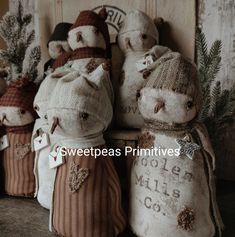 several stuffed animals are sitting next to each other