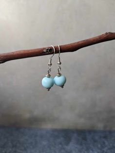 I was inspired to make these calming beautiful minimalist earrings by my beloved Lan Zhan from MDZS/The Untamed. Tell me those blues don't make you think of The Cloud Recesses!

These beauties are a perfect addition to any outfit or occasion! The one beaded earrings are lovely minimalist look while the three bead dangles are a bit more bold.

All earrings are made with .925 silver hooks. Nickel Free Light Blue Beaded Earrings For Gift, Nickel-free Light Blue Beaded Earrings Gift, Light Blue Round Bead Earrings For Gift, Elegant Light Blue Beaded Earrings As Gift, Light Blue Beaded Earrings Gift, Light Blue Beaded Earrings As Gift, Light Blue Beaded Earrings With Ear Wire As Gift, Minimalist Nickel-free Beaded Earrings As Gift, Cloud Recesses