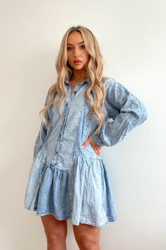 Denim love for fall! The Emily Denim Shirt Dress is made from a soft cotton denim fabric which features a striped denim overall dress print. The dress is a relaxed fit and can be worn as a denim maternity dress. The button down denim babydoll dress pairs perfectly with western knee boots, heels or sneakers. Acid-washed denim mini dress. Collared neckline. Button-front closure. Paneled design with contrasting solid and striped denim. Front pockets. Long sleeves. Drop-waist silhouette. Ruffle hem. Overall Dress Pattern, Slay Clothes, Maternity Denim Dress, Denim Dress Fall, Long Sleeve Denim Dress, Babydoll Shirt, Denim Tunic, Striped Denim