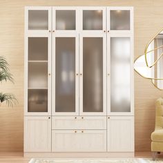 a white cabinet with glass doors in a living room