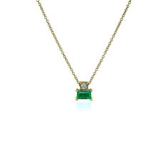 Bold design defines the eat-west setting of this vibrant baguette emerald necklace set with a delicate round diamond in 14k yellow gold. Emerald Necklace Set, Diamond Solitaire Pendant, Solitaire Pendant Necklace, Emerald Cut Diamond, Emerald Necklace, Solitaire Pendant, Blue Nile, Emerald Cut Diamonds, Bold Design