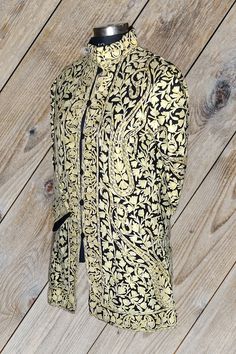 Short Kashmiri Jacket, Wedding Indian Jacket, Luxury Jacket A Kashmiri Jacket with All Over  Aari Embroidery (Front & Back) This Kashmiri jacket Makes you stand apart with its vivid colors and paisley embroidery, The base color is Black and Lemon Colour  Paisley-Aari Embroidery is done all over the jacket, the embroidery is done by brilliant Kashmiri artisans.  Embroidery      : Aari Work Length             : 40 Inches (101.6cms) [Customizable] Colour             : Black Base With Brown Embroide Traditional Fall Bandhgala With Intricate Embroidery, Traditional Bandhgala With Intricate Embroidery For Fall, Fall Bandhgala With Intricate Embroidery, Traditional Fitted Nehru Jacket For Fall, Elegant Embroidered Outerwear For Festivals, Fitted Outerwear With Resham Embroidery For Transitional Season, Formal Embroidered Sherwani For Fall, Fitted Bandhgala With Chikankari Embroidery For Fall, Fall Wedding Outerwear With Intricate Embroidery