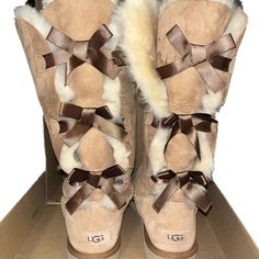 Tall Tan Ugg Boots With Three Bows Down The Back. One Side Of Bow Was Cut But The Boots Are In Great Condition. Tan Ugg Boots, Ugg Bailey Bow, Uggs Boots, Bailey Bow Uggs, Ugg Bailey, Shoes Ugg, Bailey Bow, Womens Uggs, Ugg Shoes