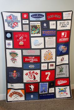 a quilt made to look like it has many different logos on it