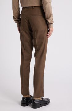 Tailored from subtly patterned wool, these all-occasion dress pants feature classic flat-front styling and a mid-rise fit that stays slim through the legs. 30 1/2" inseam; 13" leg opening; 10" front rise; 15 1/2" back rise (size 48EU) Zip fly with hook-and-bar closure Front slant pockets; back welt pockets Partially lined Unhemmed 100% wool Dry clean Imported Slim Fit Brown Bottoms For Business, Fall Business Slim Fit Bottoms, Slim Fit Brown Dress Pants With Tapered Leg, Brown Slim Fit Dress Pants With Tapered Leg, Brown Slim Fit Dress Pants For Fall, Wool Business Casual Suits With Tapered Leg, Wool Tapered Leg Business Casual Suit, Brown Slim Fit Dress Pants For Business Casual, Wool Tapered Leg Suits For Business Casual