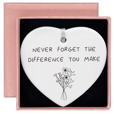 a heart shaped ornament with the words, never forget the differences you make