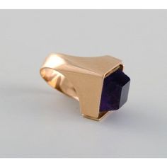 Allan Børge Larsen. Danish goldsmith (active 1967-2006). Modernist vintage ring in 14 carat gold adorned with purple amethyst. Diameter: 17 mm. US size: 6.5. In excellent condition. Stamped. Weight: 9 grams. This piece is attributed to the mentioned designer/maker. It has no attribution mark and no   official proof of authenticity,   however it is well documented in design history. I take full responsibility for any authenticity         issues arising from misattribution Modernist 14k Gold Ring For Formal Occasions, Formal Modernist 14k Gold Ring, Modernist Yellow Gold Rings For Formal Occasions, Modernist 14k Gold Signet Ring With Polished Finish, Modern Gemstone Signet Ring For Formal Occasions, Modernist 14k Gold Formal Ring, Modern Yellow Gold Amethyst Ring For Formal Occasions, Modern Gold Amethyst Gemstone Ring, Purple Elegant Signet Ring For Formal Occasions