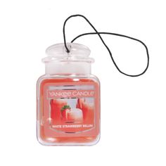 yankee candle white strawberry bellow jar with black string on the top and lid, in front of a white background