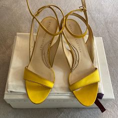 Brand New In Box Stella Mccartney Yellow Satin Heels With Gold Trim. Strap Wraps Around Ankle Size 7.5. Fell In Love With These Heels But Never Wore Them. Time To See Them Go To A Good Home. Elegant Yellow Sandals For Formal Occasions, Yellow Round Toe Heels For Evening, Yellow Round Toe Sandals For Evening, Yellow Open Toe Evening Heels, Yellow Open Toe Heels For Evening, Yellow Heels With Wrapped Heel For Evening, Formal Yellow Sandals With Wrapped Heel, Formal Yellow Sandals, Yellow Wedge Heels With Heel Strap