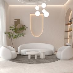 a modern living room with white furniture and round lights hanging from the ceiling above it