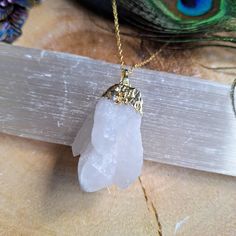 Clear quartz cluster necklace pendant Master healer  Balance  Mental clarity  Stability  Healing in all areas  Can be a gift for loved ones, friends or a treat to yourself.   Comes in a gift bag. PER ORDER you will receive a complimentary crystal that will be chosen intuitively and an oracle card.  Instructions for how to cleanse and charge will also be included. Please note that due to the fact these are natural stones, the colours may vary but will be equally as beautiful. Feel free to contact Gift Crystal Pendant Necklace With Raw Stone, Raw Stone Crystal Pendant Necklace Gift, Spiritual Dangle Charm Necklaces As Gift, Spiritual Raw Stone Necklace For Gift, Spiritual Gemstone Charm Necklace As Gift, Spiritual Pendant Charm Necklace For Mother's Day, Mother's Day Gift Crystal Pendant Necklace, Mystical Crystal Necklace With Round Pendant As Gift, Mystical Raw Stone Crystal Necklace Gift