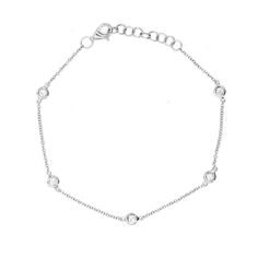 This dainty diamond bracelet is a perfect gift for brides and bridesmaids.  Five diamonds totalling 0.13cttw are bezel set on a 7 inch dainty adjustable chain.  Perfect for everyday wear and special occasions. Classic Silver Diamond Bracelet With Bezel Setting, Dainty Silver Diamond Bracelet With Bezel Setting, Dainty Bezel Set Chain Bracelet, Elegant Silver Diamond Bracelet With Bezel Setting, Classic Diamond Bracelet With Delicate Chain, White Gold Diamond Bracelet With Bezel Setting For Wedding, Dainty Bezel Setting Tennis Bracelet, Wedding Bracelets In Diamond White With Bezel Setting, Adjustable Bezel Set Cubic Zirconia Diamond Bracelet