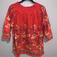 Women’s Embroidered Top Brand New With Tags Never Worn Turtle Neck Scrunched Embroidered Designs Very Comfortable Floral Print Tops For Spring Festive Season, Spring Festive Floral Print Tops, Casual Embroidered Floral Top For Fall, Red Floral Embroidered Top For Vacation, Casual Embroidered Top For Spring Festive, Casual Red Blouse With Floral Embroidery, Casual Blouse With Multicolor Floral Embroidery, Spring Festive Printed Blouse, Casual Embroidered Top For Spring Festive Occasion