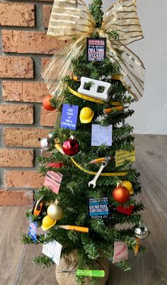 a small christmas tree decorated with various items