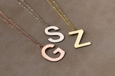 This personalized initial necklace is 14k Solid GOLD ( not filled or plated).  Personalized solid gold necklace in 14k Gold, Rose Gold, White Gold.  You can customize this 14k solid gold necklace with a letter of your choice.  #personalizednecklace #VivaRing #14kgoldnecklace #personalizedchoker #customnecklace #PersonalizedJewelry #personalizedgift #namenecklace #initialnecklace  #lovegifts #personalizedpendant #birthdaygiftromantic #romanticgifts #giftsforbestfriend Gift White Gold Initial Necklace With Polished Finish, White Gold Initial Necklace With Polished Finish For Gift, Polished Initial Pendant Necklace For Gift, Gift Initial Pendant Necklace With Polished Finish, Classic Initial Necklace With Polished Finish Gift, Modern Gold Initial Necklace For Anniversary, Classic Polished Initial Necklace For Gift, Modern Initial Pendant Necklace As Gift, Silver Charm Necklace With Initials In 14k Gold