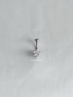 - 14g - 10mm bar - Water resistant - Surgical steel bar - Cubic zirconia star charm Belly Button Piercing Cute, Navel Piercing Jewelry, Belly Button Piercing Jewelry, Belly Piercing Ring, Belly Button Jewelry, Belly Bars, Piercing Ring, Navel Piercing, Belly Piercing