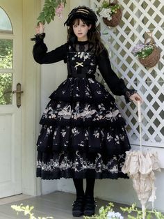 This enchanting piece features a delicate daisy and flower basket print, adding a touch of whimsical charm. The smocked back ensures a comfortable and flattering fit, while the tiered skirt design provides a graceful silhouette. Perfect for tea parties, garden strolls, or any occasion that calls for classic Lolita sophistication.   	 		 			Size 			S 			M 			L 		 		 			Full Length 			117-120 			120-123 			123-126 		 		 			Bust 			78-90 			83-95 			88-100 		 		 			Waist 			62-74 			67-79 			72-84 Cute Fitted Dress With Tiered Skirt, Garden Party Dresses With Lace Trim And Tiered Skirt, Lace Trim Tiered Skirt Dresses For Garden Party, Cute Cotton Dress With Tiered Skirt, Cute Cotton Tiered Dress, Cottagecore Dresses With Ruffles And Tiered Skirt, Cottagecore Tiered Dress With Ruffles, Cottagecore Tiered Skirt Dress With Ruffles, Spring Floral Embroidered Tiered Skirt Dress