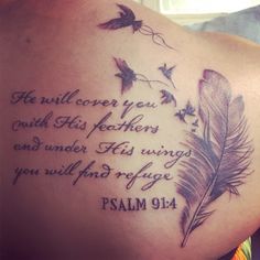 the back of a woman's shoulder with a quote on it and some birds flying around