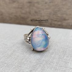 Welcome to our shop 925SilverGems22 Description:-   Style:- Band Advantages of Aurora Opal Ring :- Aurora Opal Metaphysical Properties It is supposed to boost intuition, inspire creativity, and encourage emotional equilibrium. Others believe it has the power to magnify good vibes and drive away bad ones   Occasion:- Anniversary Gift, Birthday Gift, Wedding Gift, Gift Pendant, Valentine's Gift, Engagement Gift, New Year Gift, Christmas Gift, Other Occasion, etc. Your order will be handmade and re Sterling Silver Spiritual Opal Ring, Spiritual Sterling Silver Opal Ring Birthstone, Handmade Silver Opal Teardrop Ring, Handmade Silver Teardrop Opal Ring, Sterling Silver Cabochon Opal Ring For Anniversary, Sterling Silver Opal Ring With Cabochon For Anniversary, Silver Opal Ring As Gift, Silver Opal Ring For Gift, Silver Opal Ring Perfect As A Gift