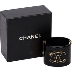 Important Chanel black lucite hinged oval cuff, CC logo with clover. Comes with original box. Designer Black Cuff Bracelet For Gift, Designer Black Cuff Bracelet As Gift, Designer Bangle Jewelry As Fashion Accessory, Designer Black Enamel Bracelets, Designer Black Enamel Bracelets For Gift, Designer Black Enamel Bracelets As Gift, Designer Cuff Bracelet For Formal Occasions, Designer Black Cuff Bracelet For Formal Occasions, Black Chic Cuff Bracelet For Formal Occasions