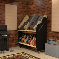 a room filled with lots of guitars and amps next to a wall mounted piano