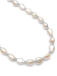 Cultured Baroque White Freshwater Pearls We use cultured pearls from oysters and freshwater mussels that we select by hand for all our jewelry Stainless Steel Divider Beads and Lobster Clasp Approximate pearl size: 10 x 12 mm each Necklace has a 1.5 Inches Extension Chain Model is wearing 20 Inch Necklace Product Code: MNEC_189 Designer's Notes Strung by hand on a strong metal wire in our LA studio, this necklace with beautiful baroque pearls will add a unique touch to all your looks. Wear this Anniversary Pearl Necklace With Polished Beads, Beaded Rondelle Pearl Necklace, Rondelle Pearl Necklace With Polished Beads, Adjustable Pearl Necklace With Polished Beads, Pearl White Oval Beads Pearl Necklace, White Oval Pearl Necklace, Beaded Pearl Necklace With Oval Beads, Pearl Necklace With Oval Beaded Pearls, Freshwater Mussels