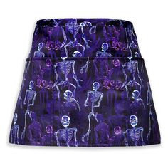 a purple skirt with skeletons on it