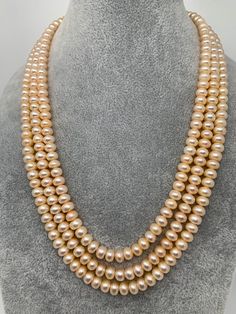 Our Real fresh water cultured pearls collection are real genuine pearls polish and shine on the pearls are natural and will stay as it is life long and can be used by generations. Natural Pearls have naturally varying undulations on the surface This classy pearl necklaces wear it with confidence worth every money spent. Mala Length : Approx 18 Inches No Earrings Pearls Mala, Beads Haram, Real Pearl Jewellery, Pearl Chains, Haram Designs, Gold Haram, Pearl Mala, Fresh Water Pearl Necklace, Gold Pearl Jewelry